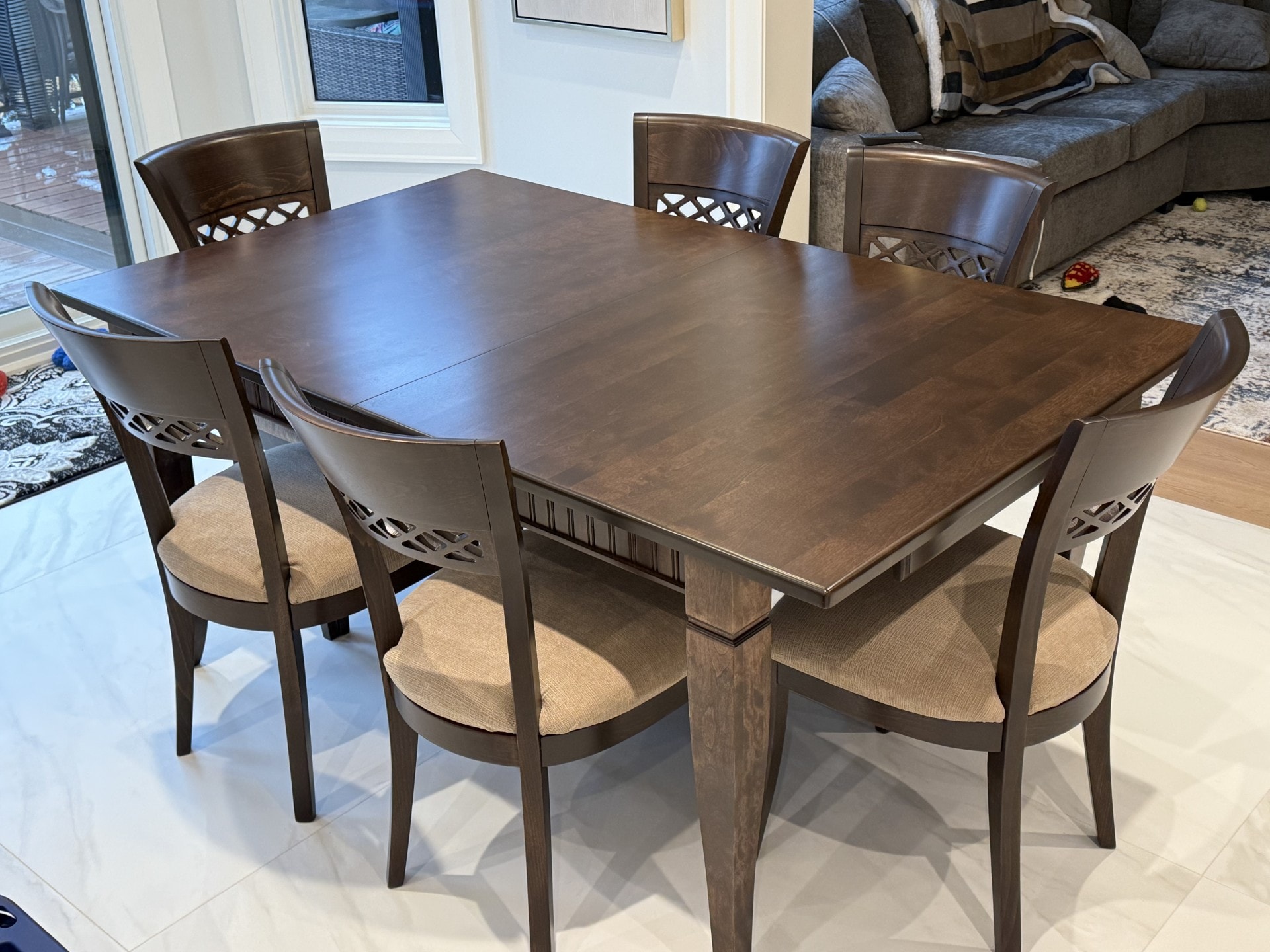 Wooden dining table with four chairs