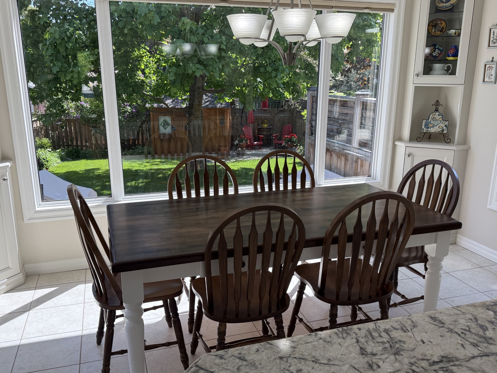 Dining room with garden view through windows