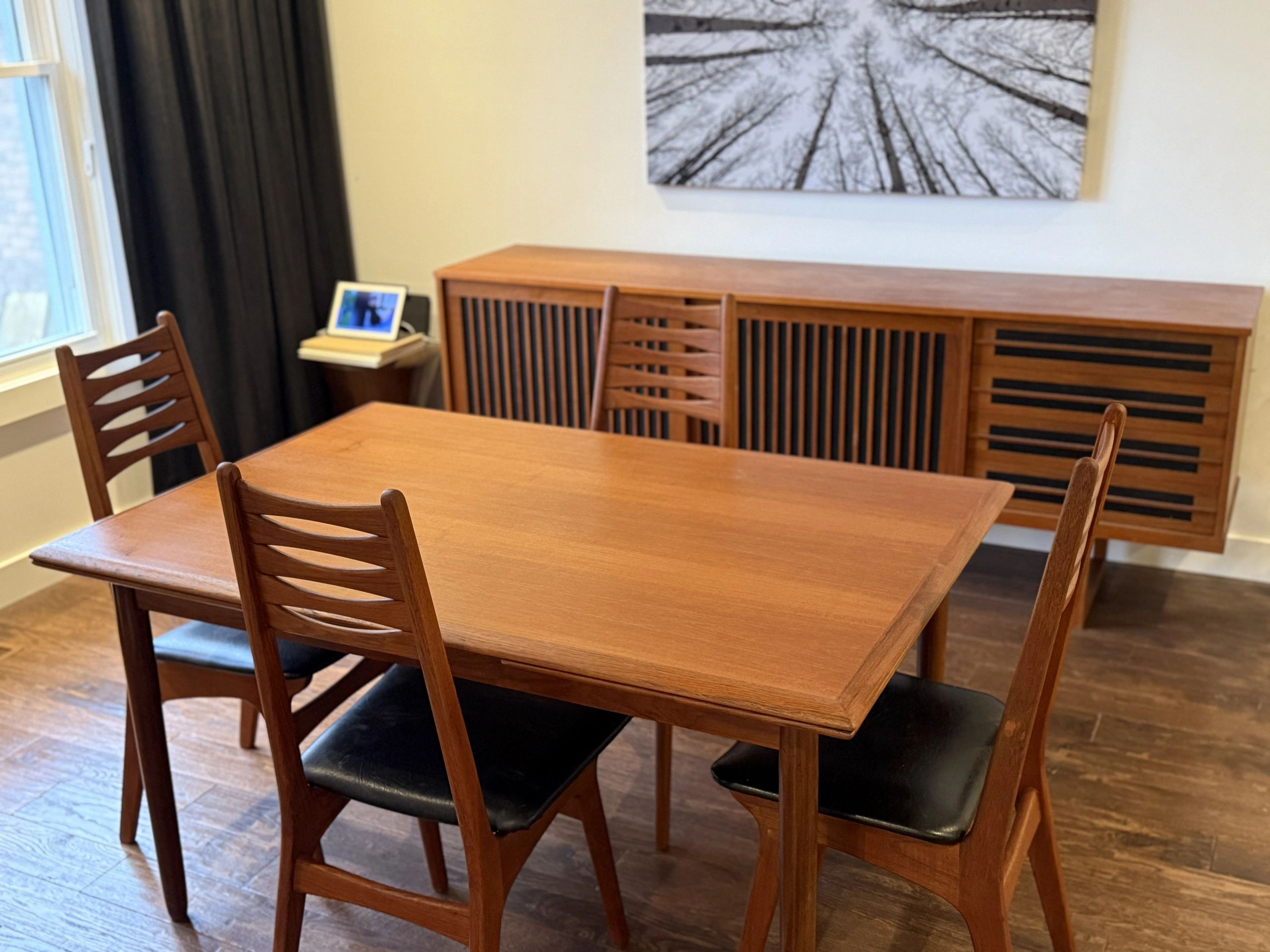 Mid-century modern dining room with wooden table and chairs