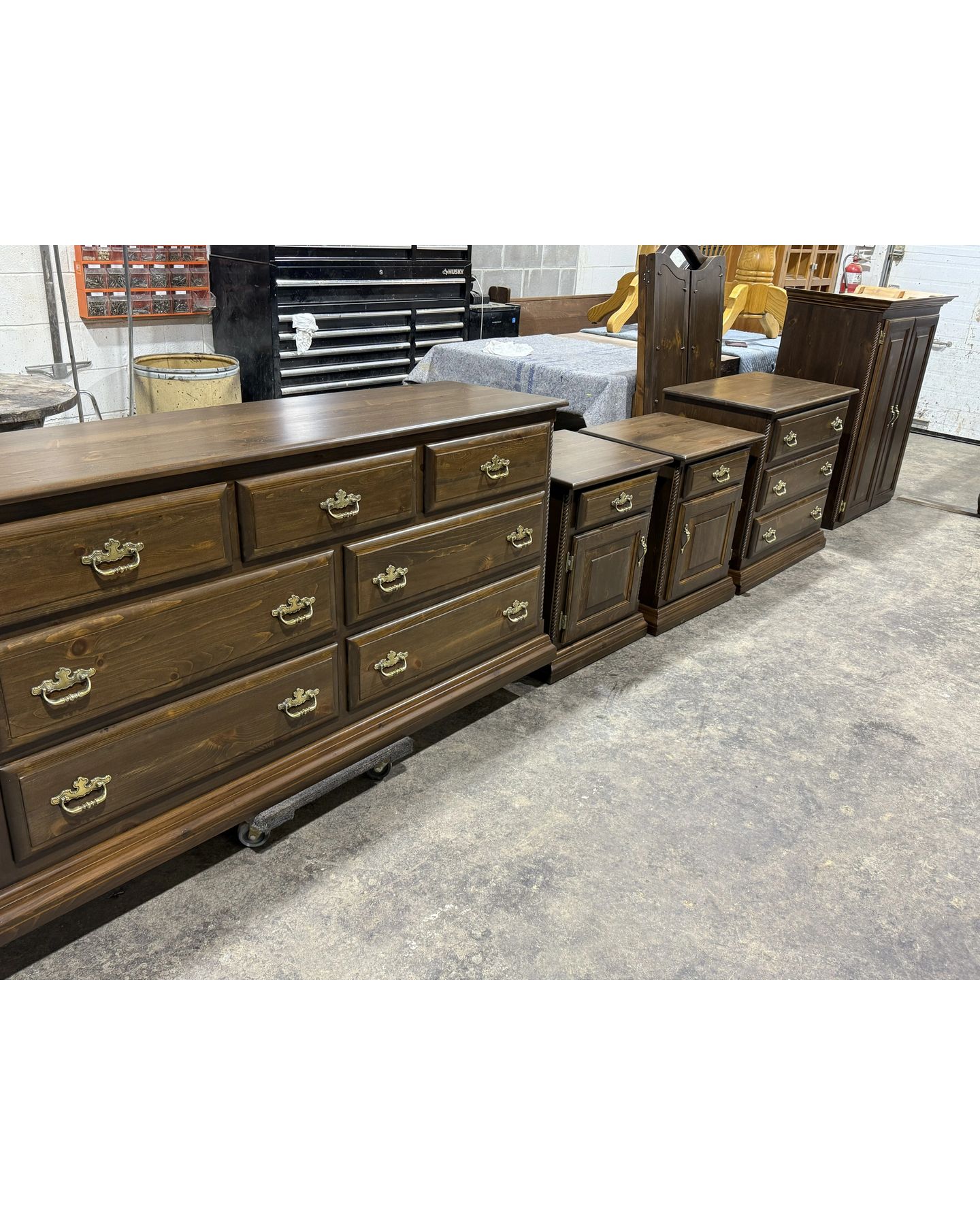 Wooden bedroom furniture pieces with rich dark wood finish