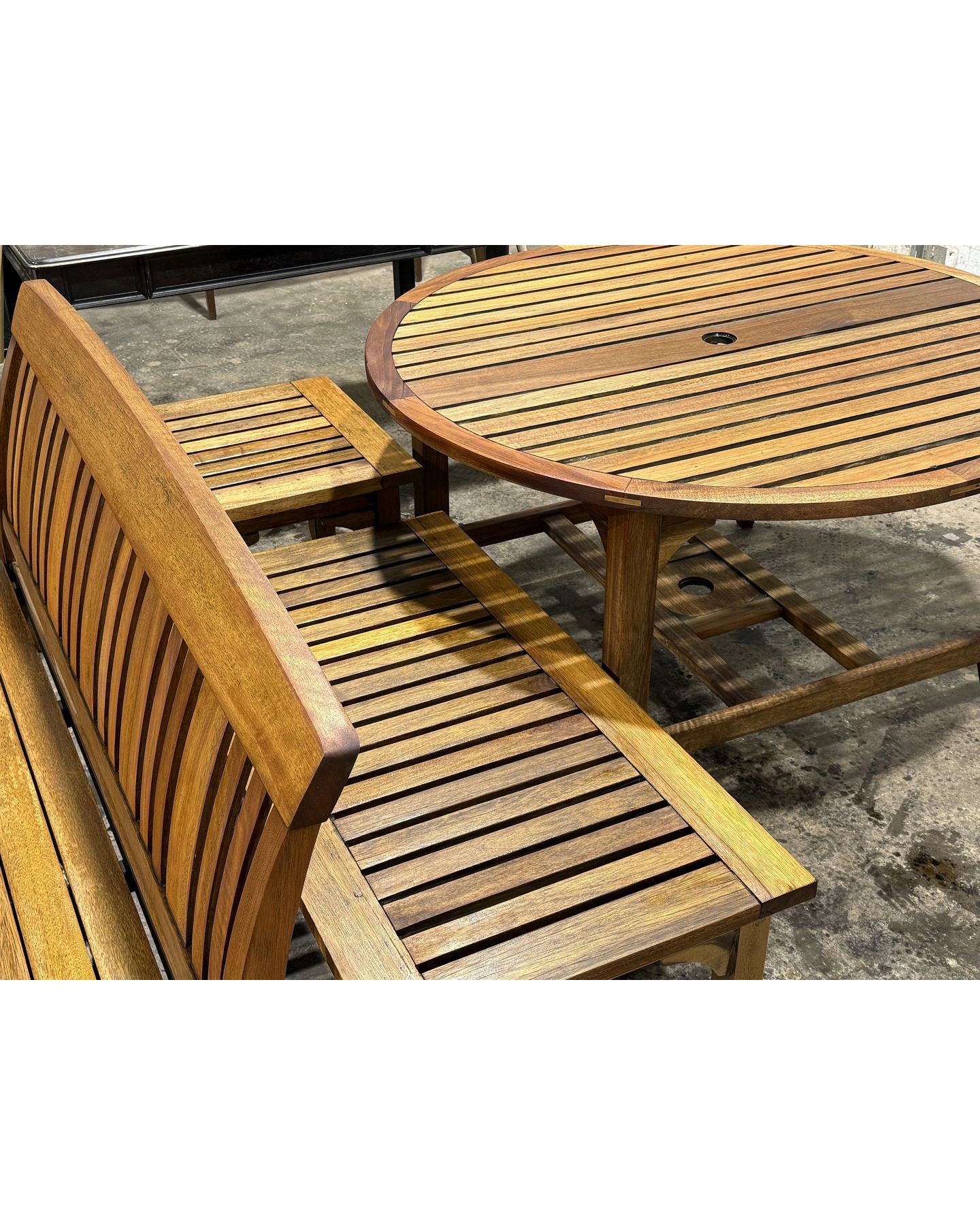 Wooden outdoor furniture in showroom